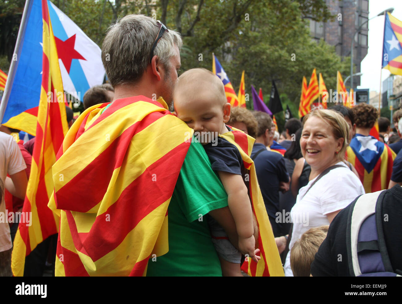 People with Catalan flags celebrating the National Day of Catalonia (Diada Nacional de Catalunya) 11 September, Barcelona. Stock Photo