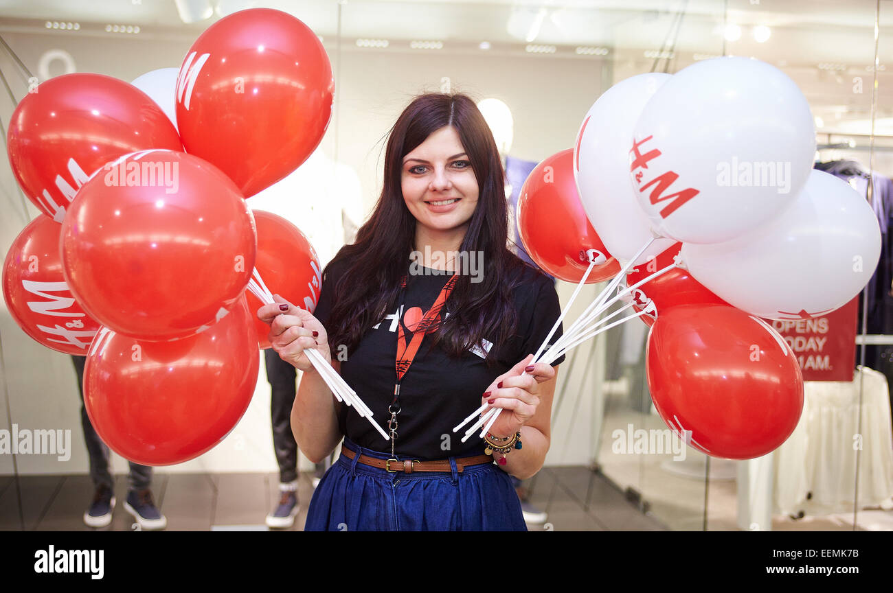 Staff member holding balloons for the opening of a new H&M store in the  Clarendon Centre, Oxford Stock Photo - Alamy