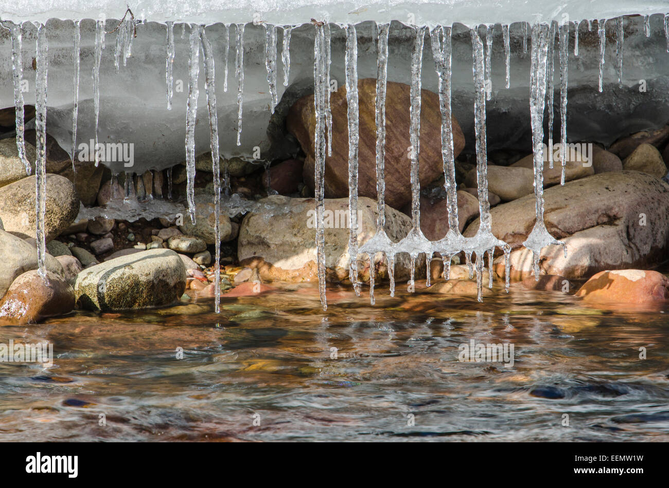 Eiszapfen an einem Bach, Ljoerdalen, Hedmark Fylke, Norwegen, April 2012 Stock Photo