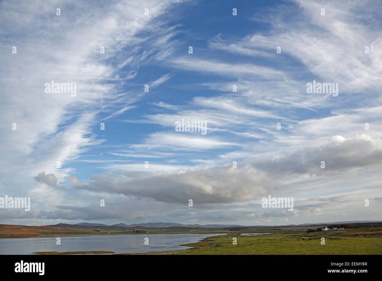 Cirrus and Nimbostratus cloud formations over Islay looking towards the head of Loch Gruinart Scotland UK October 52424 Stock Photo