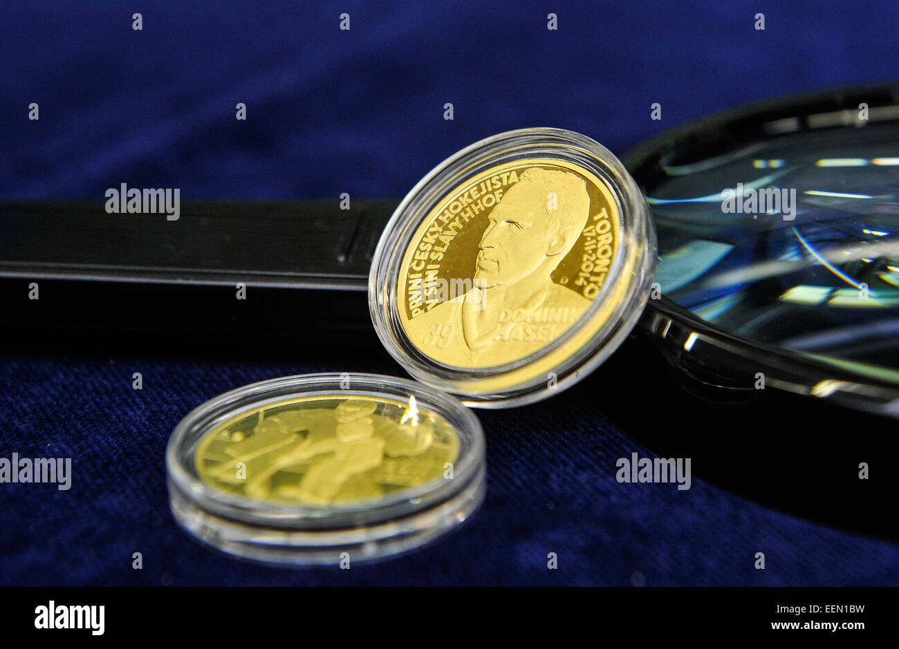 Buffalo Sabre goaltender Dominik Hasek coins his own gold half-ounce medal, commemorating his induct to The Hockey Hall of Fame in Toronto last year, in Jablonec nad Nisou Mint, Czech Republic, on Tuesday, January 20, 2015. (CTK Photo/Radek Petrasek) Stock Photo