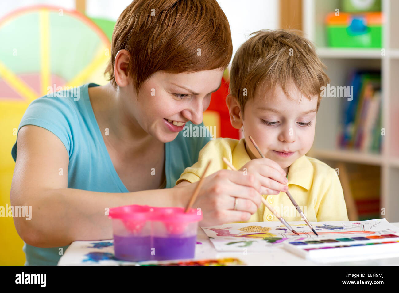 Parent and kid painting hi-res stock photography and images - Alamy