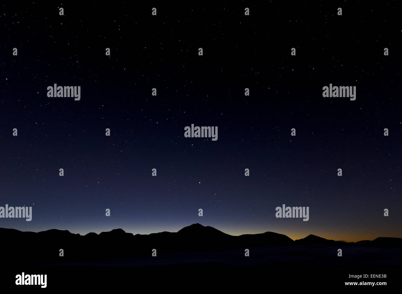 Dusk and night sky over peaks in Rondane National Park , Hedmark Fylke, Norway, October Stock Photo