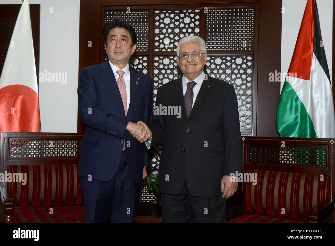 Ramallah. 20th Jan, 2015. Japan's Prime Minister Shinzo Abe (L) shakes hands with Palestinian President Mahmoud Abbas during their meeting in the West Bank city of Ramallah on Jan. 20, 2015. © Pool/Xinhua/Alamy Live News Stock Photo