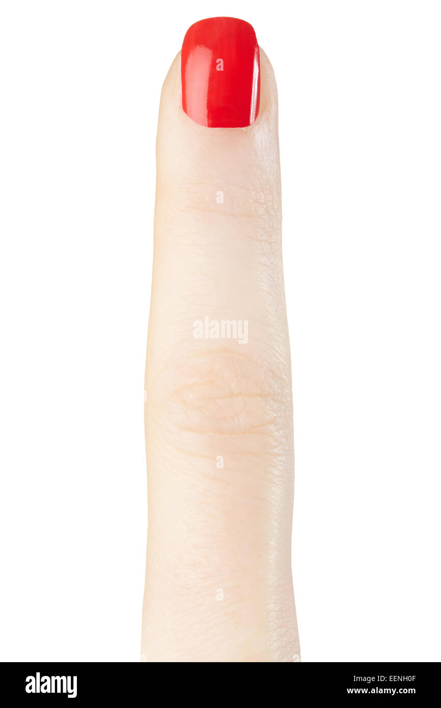 Female finger with red nail polish manicure Stock Photo