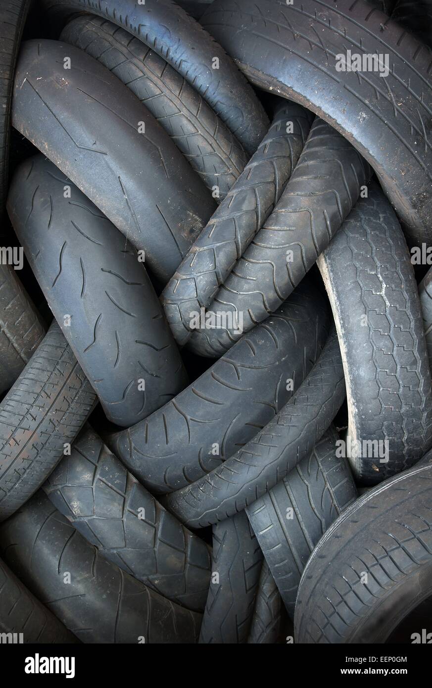 Pile of old worn out tires for recycling Stock Photo