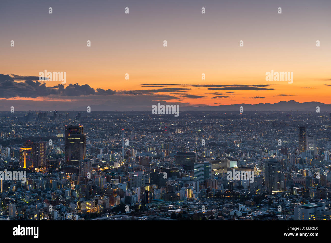 The sun sets over the sprawling cityscape of Tokyo. Stock Photo