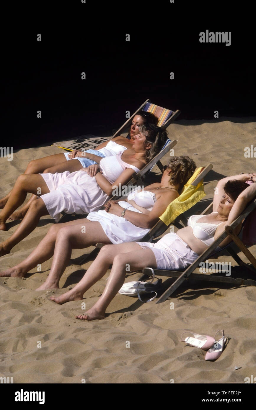 Four women sunbathing in their underwear. Margate. Kent. UK Stock Photo -  Alamy