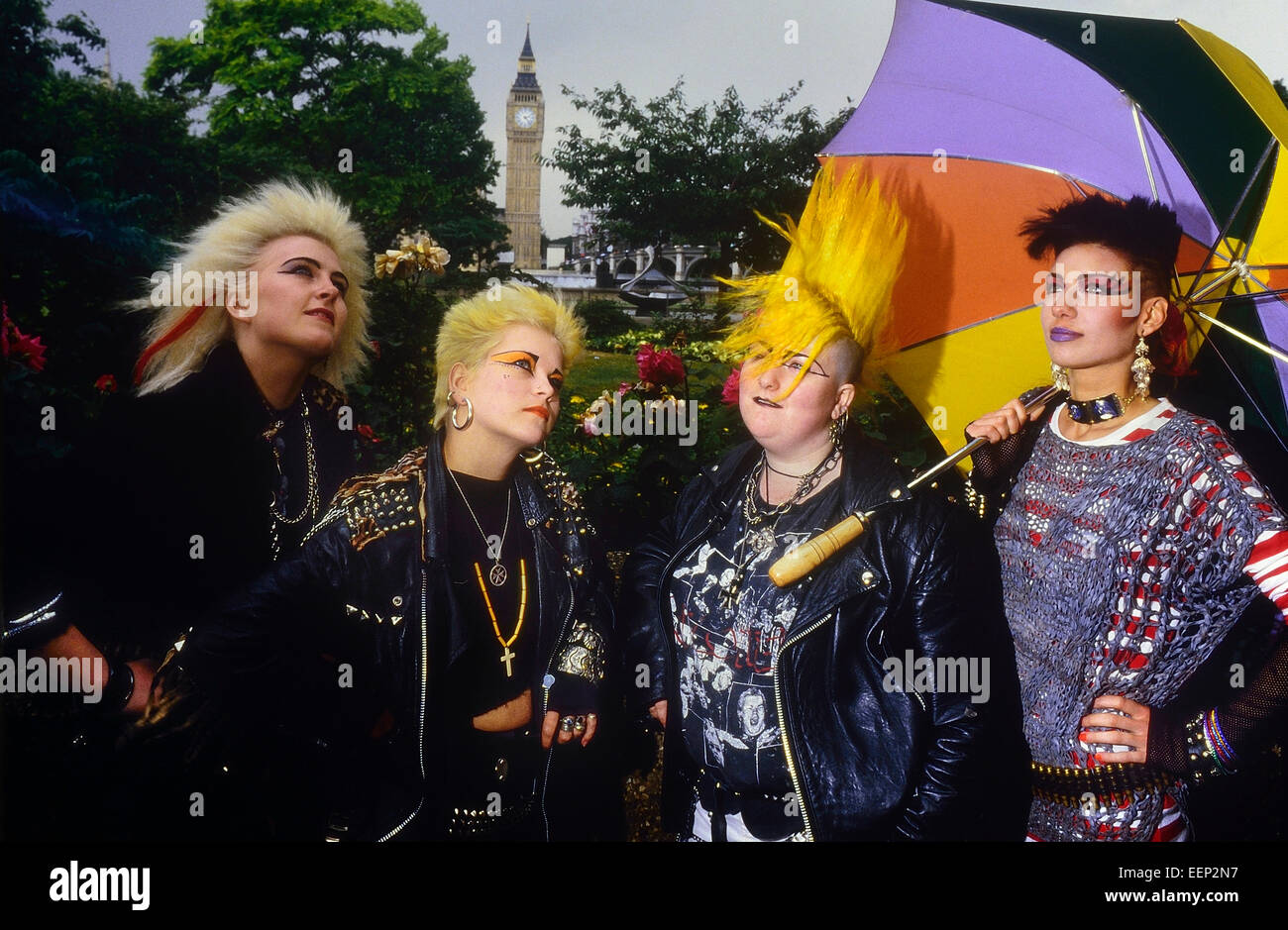 Female punk rockers posing in front of The Houses of Parliament.  London. Circa 1985 Stock Photo