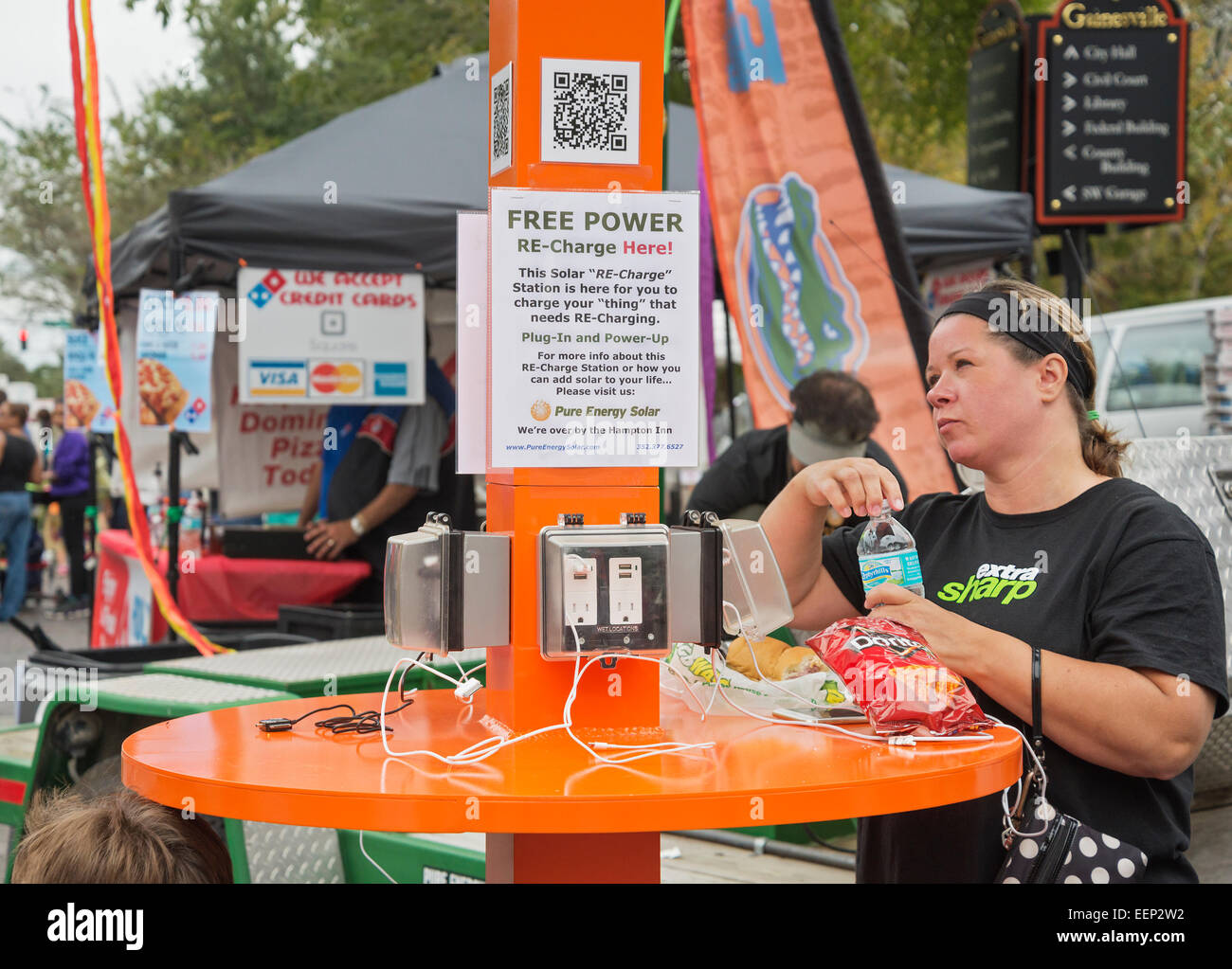 Solar powered re-charging station at Downtown Arts Festival in Gainesville,  Florida Stock Photo - Alamy