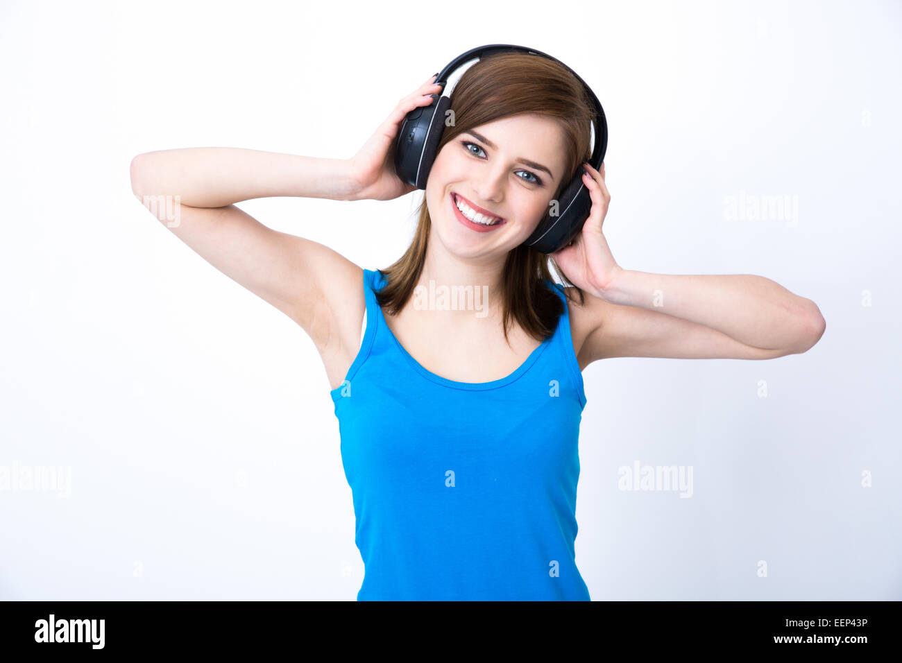 Cheerful woman with headphones listening music Stock Photo - Alamy