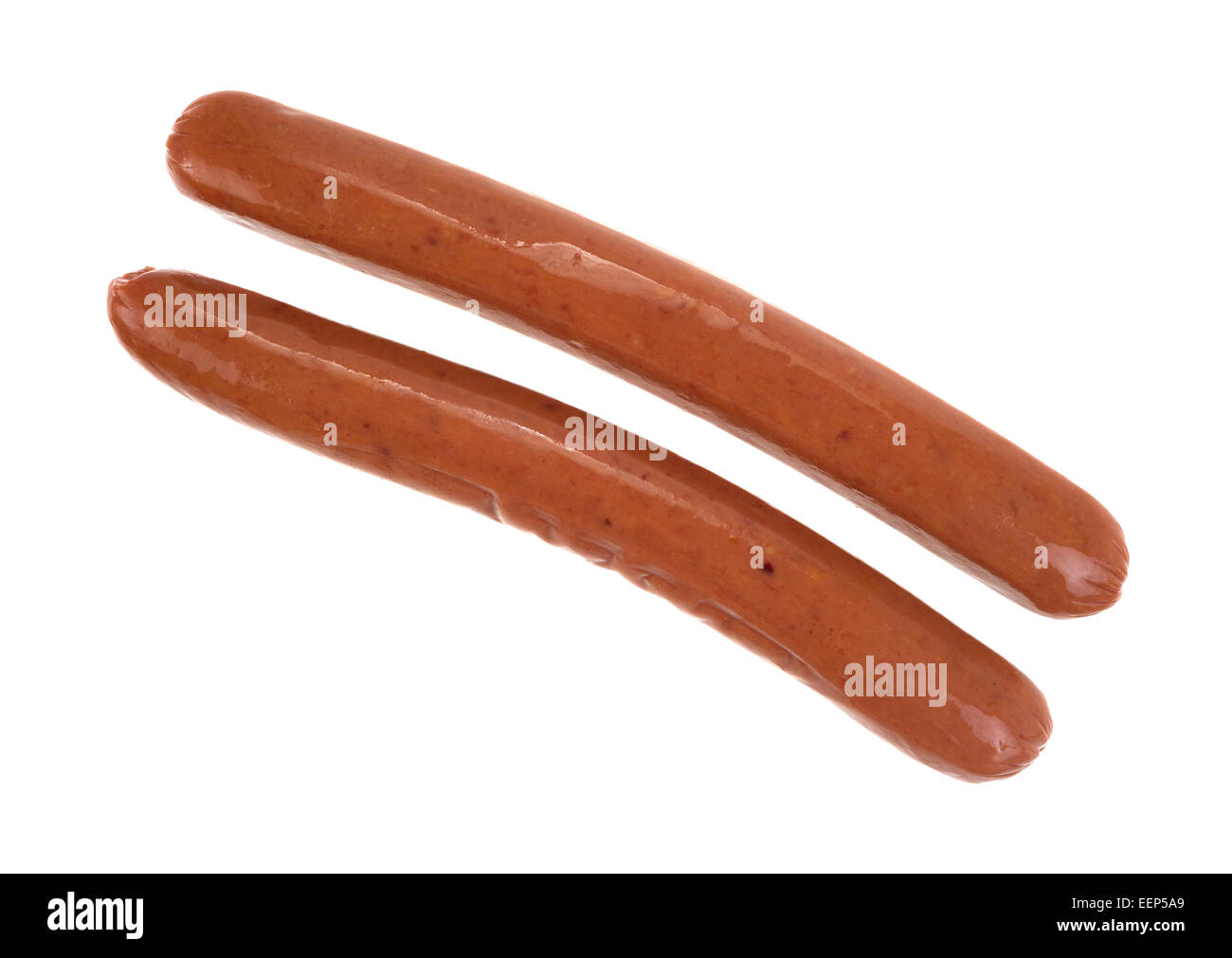 Two long links of smoked sausages on a white background. Stock Photo