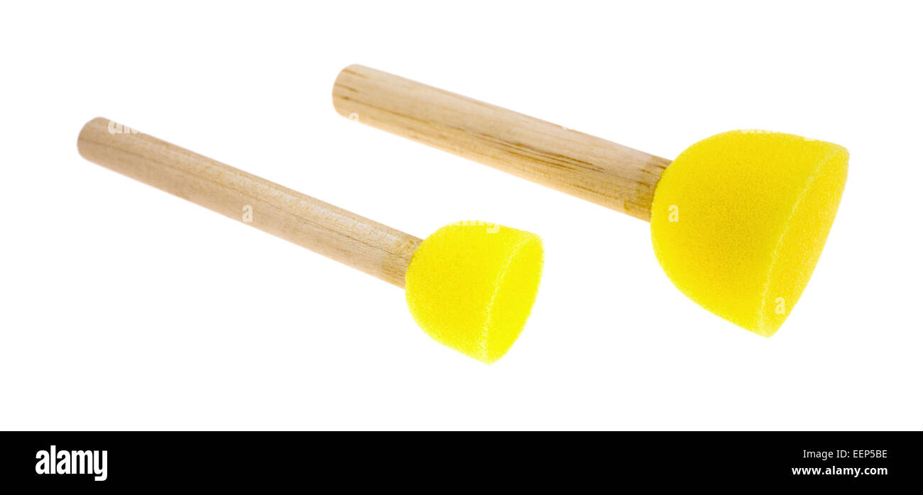 Two foam tipped wood handle stenciling brushes on a white background. Stock Photo