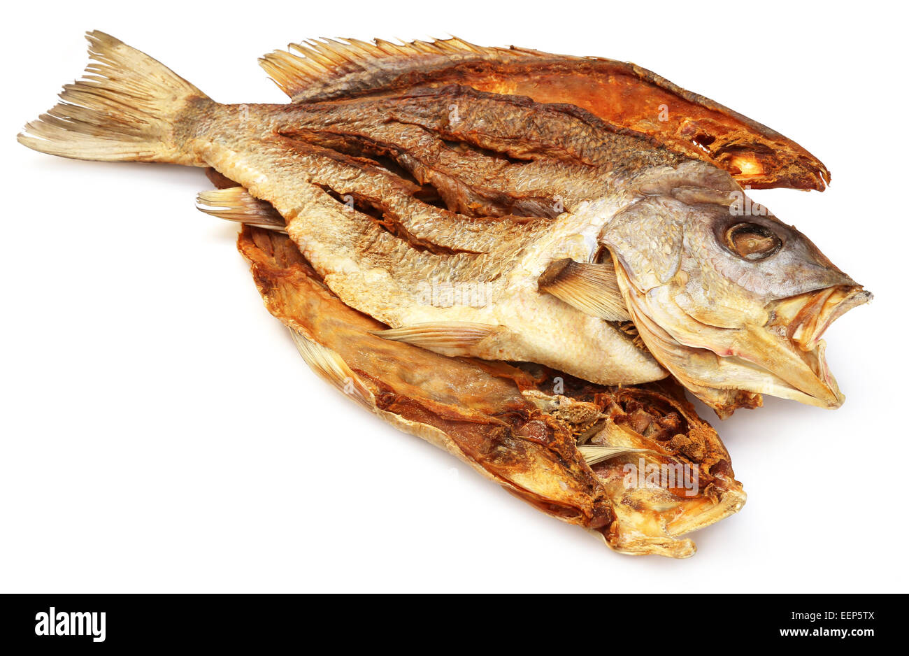 Dried Barramundi or Koral fish of Southeast Asia over white background Stock Photo