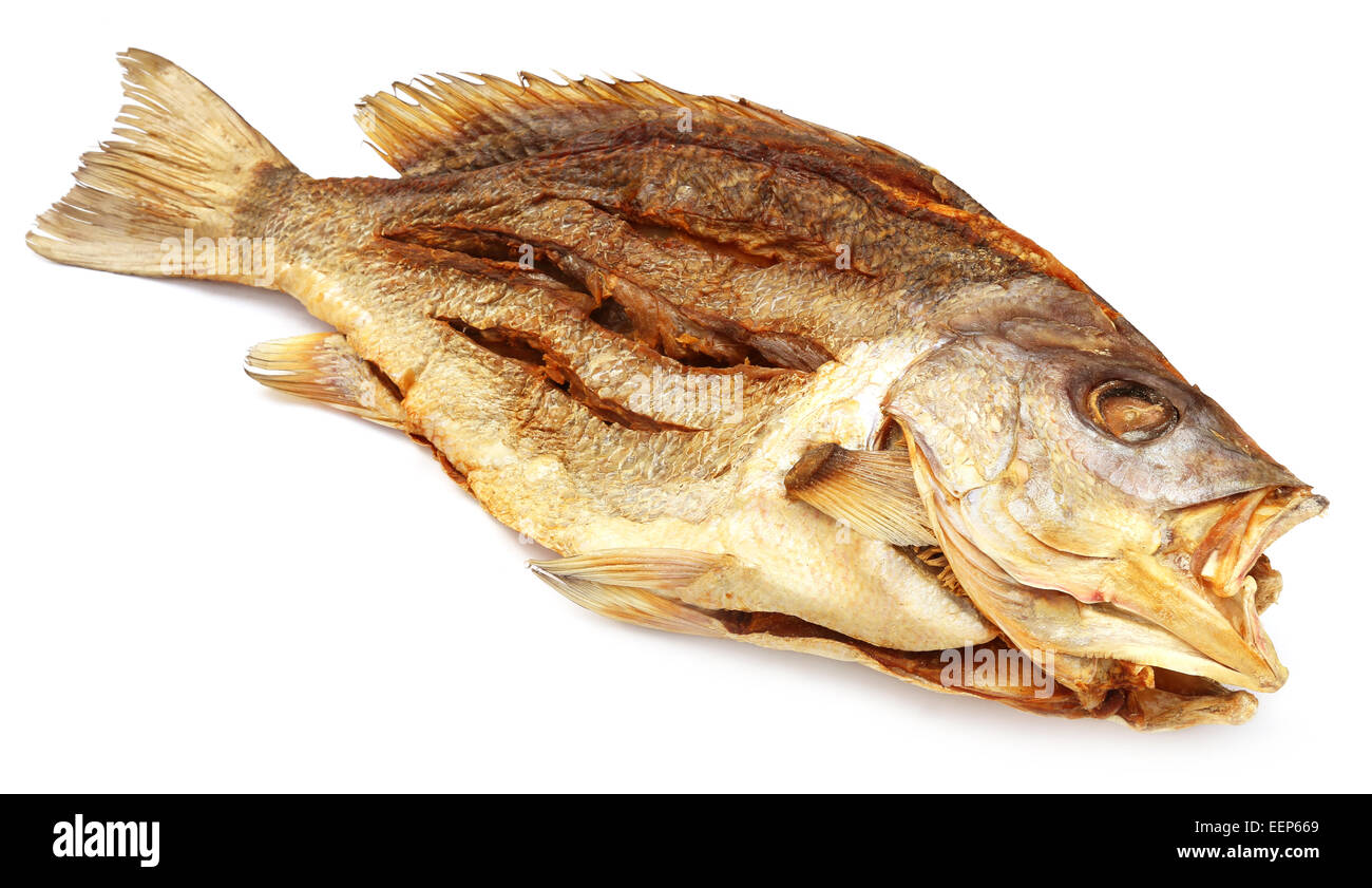 Dried Barramundi or Koral fish of Southeast Asia over white background Stock Photo