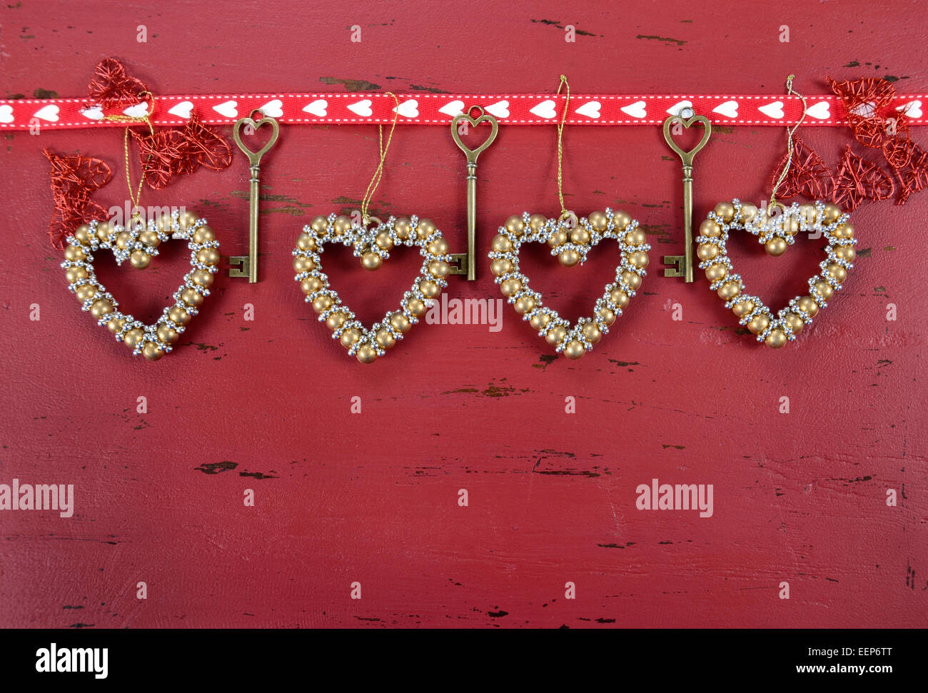 Happy Valentine's Day red vintage wood background with hanging gold ...