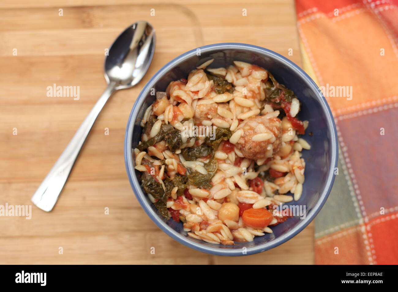 Chicken Meatball Soup with Kale, Chickpeas & Orzo Stock Photo