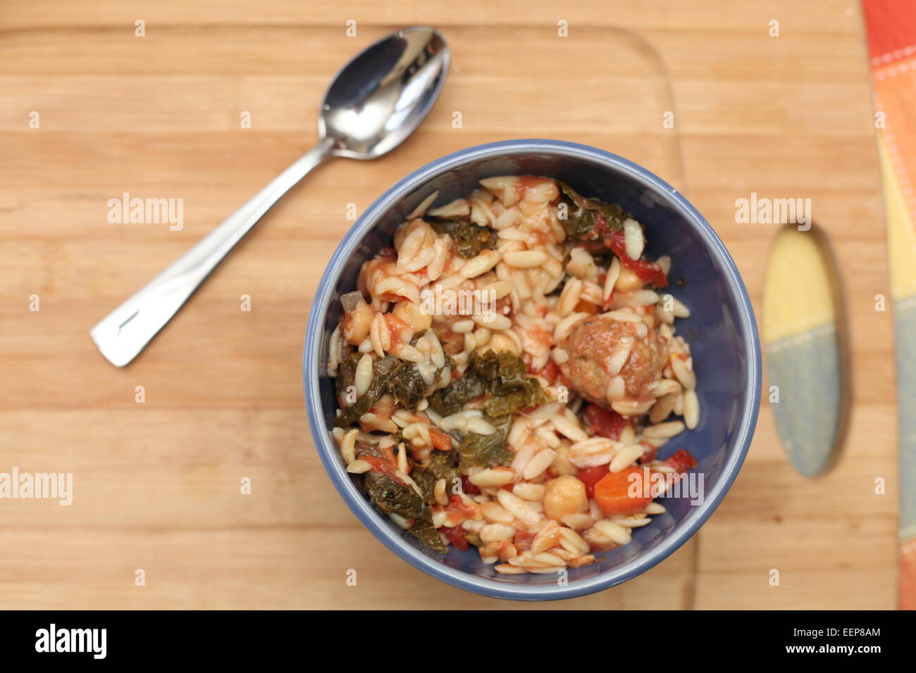 Chicken Meatball Soup with Kale, Chickpeas & Orzo Stock Photo