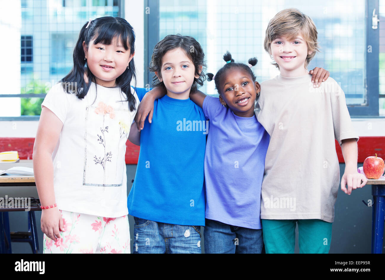 Happy kids in classroom. Multirace concept. Stock Photo