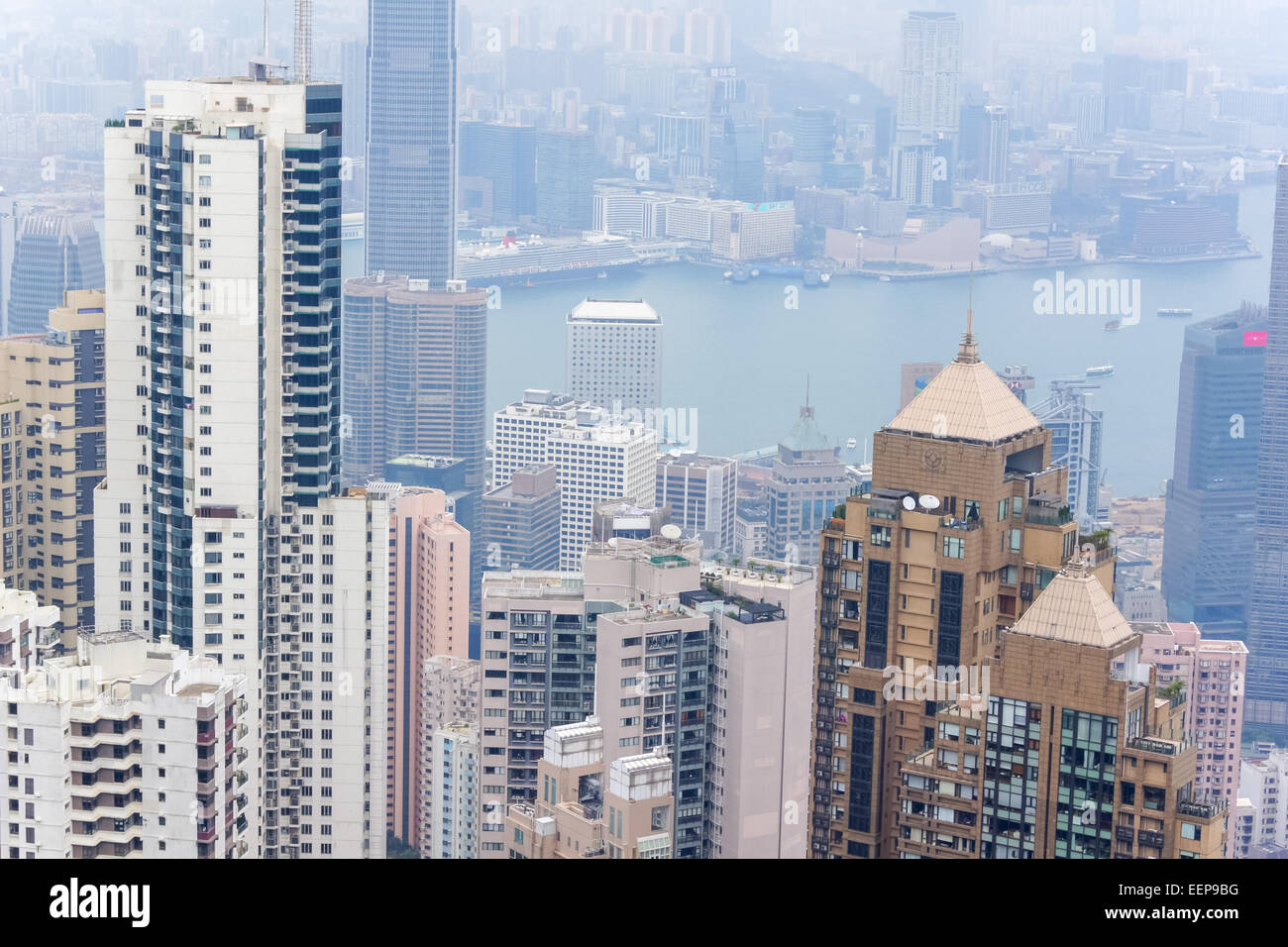 View of high rise residential apartments and commercial skyscrapers from The Peak, Hong Kong Island Stock Photo