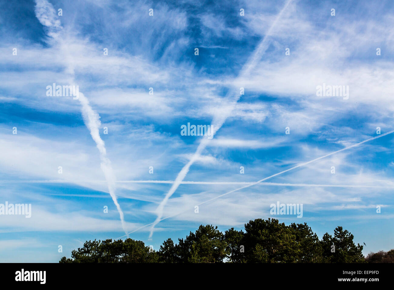 Contrails from jet aircraft in the sky, Stock Photo