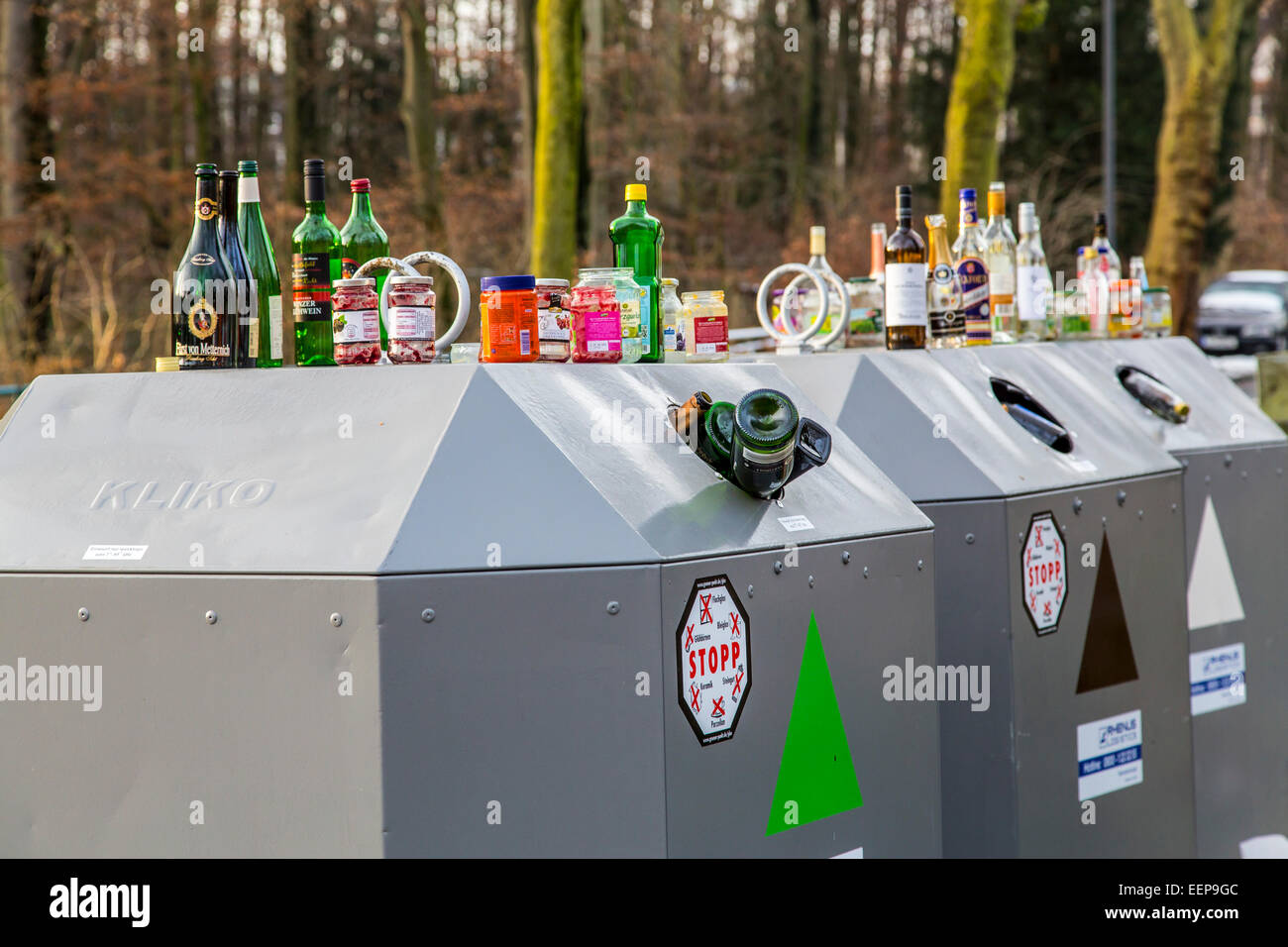 Recycling glass container, crowded, bottles and glasses pile up and