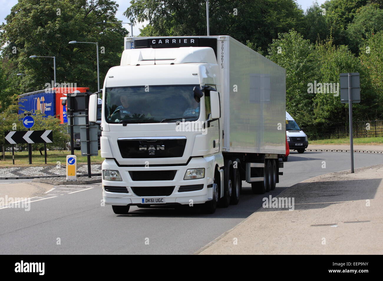 A truck leaving a roundabout in Coulsdon, Surrey, England Stock Photo
