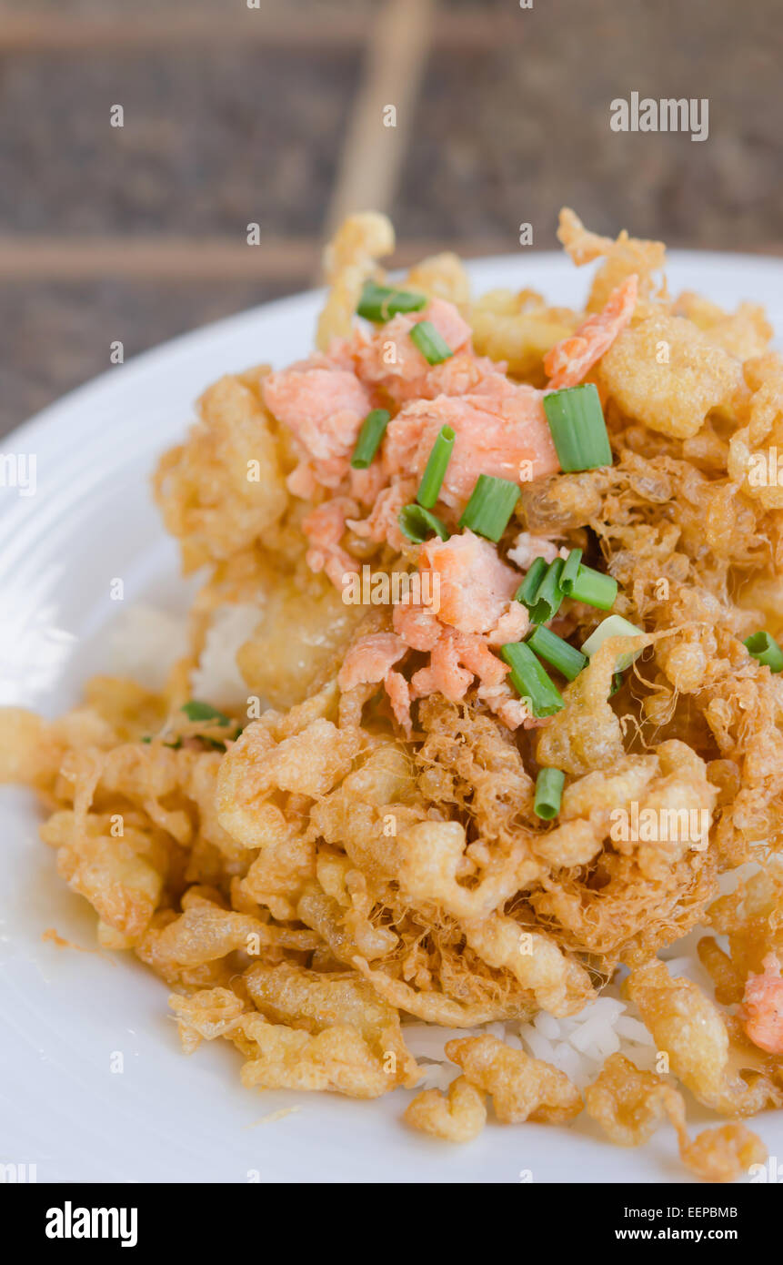 fried crispy beaten egg omelette served with steamed rice Stock Photo