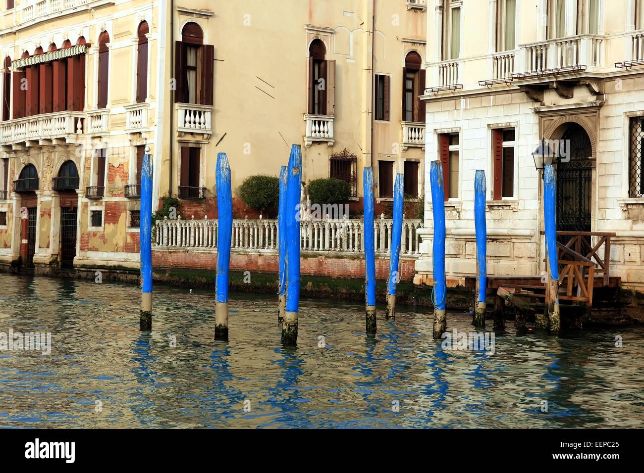 Wood dock in the Grand Canal of Venice Stock Photo - Alamy