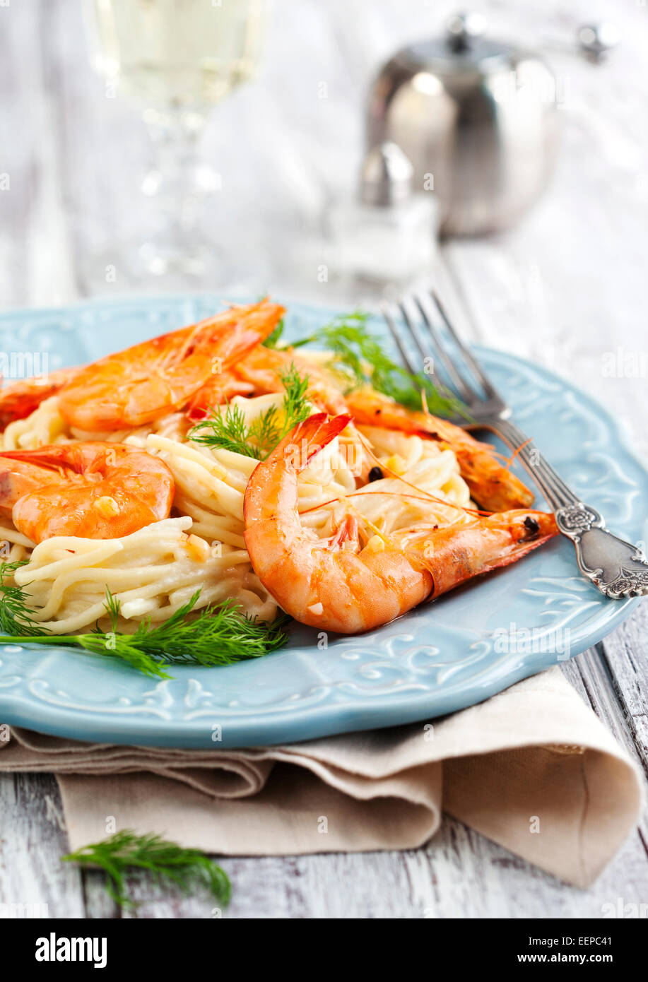 Plate of delicious prawns spaghetti with creamy sauce Stock Photo