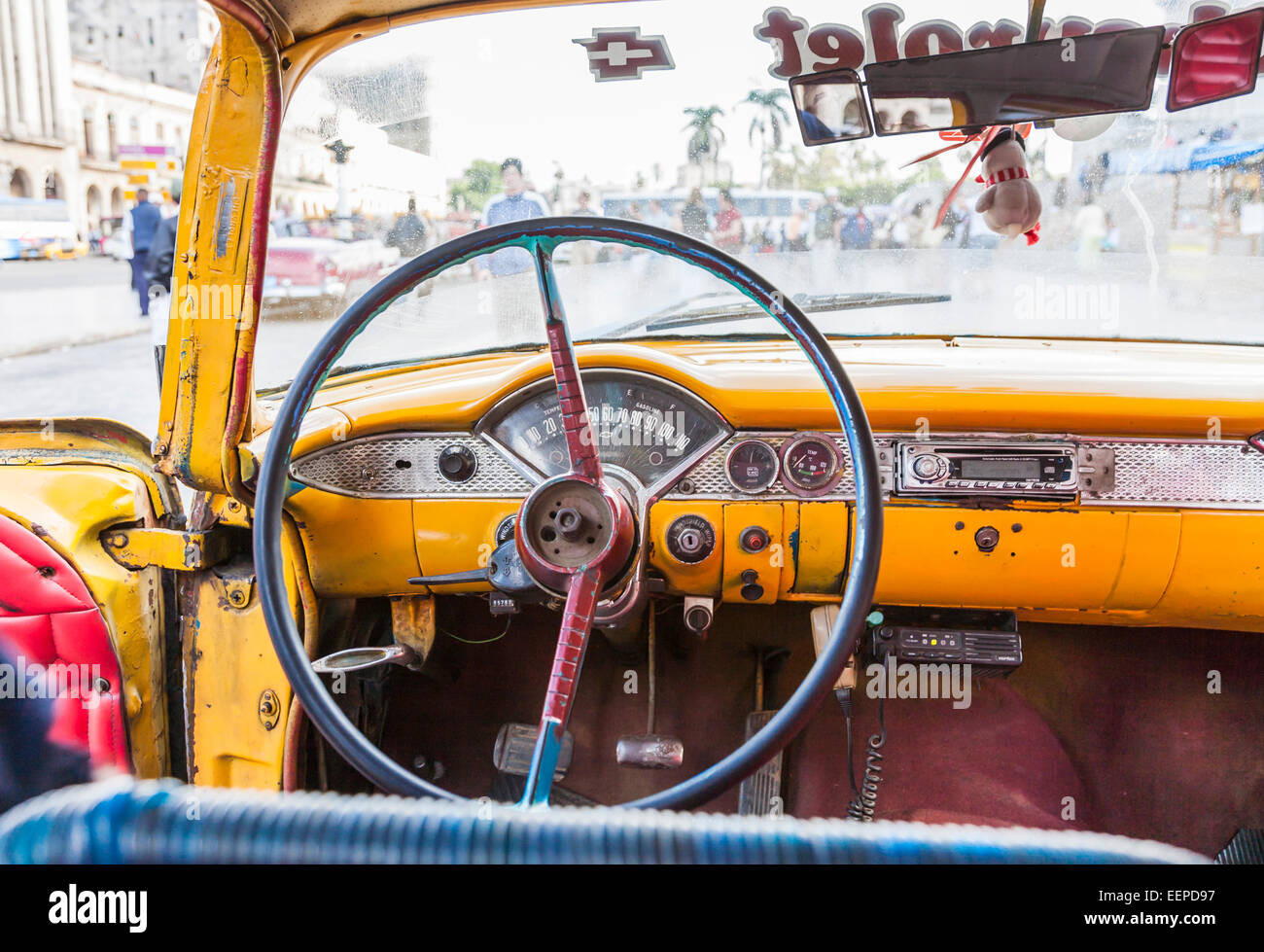 Dilapidated steering wheel and interior of a typical battered old vintage Cuban taxi, old Havana, Cuba Stock Photo