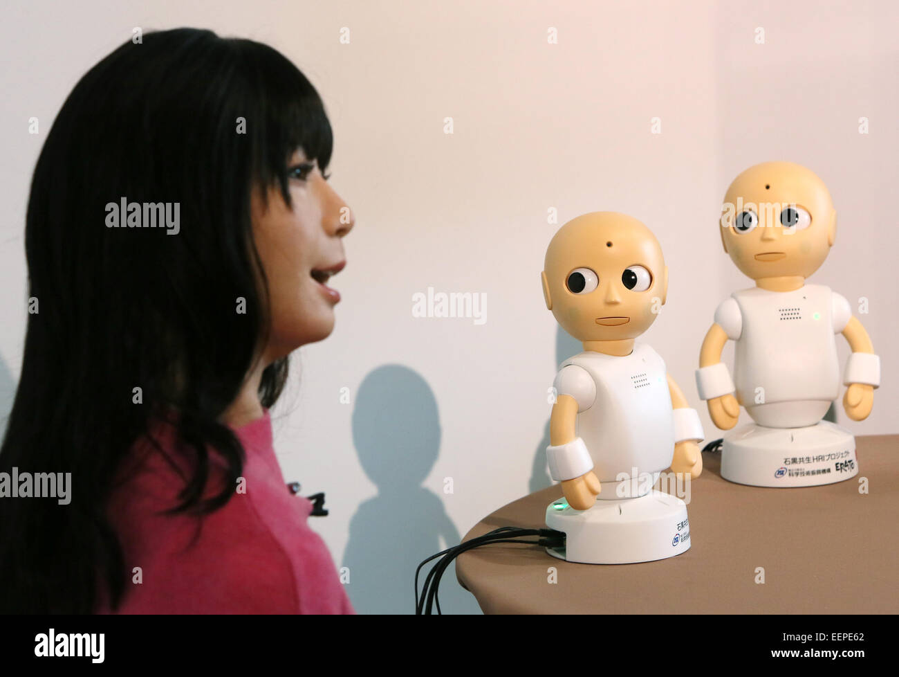 Tokyo, Japan. 20th Jan, 2015. A symbiotic human-robot Otonaroid, left, and  two talking robots "CommU" are shown to the media in Tokyo on Tuesday,  January 20, 2015. Eerily lifelike Otonaroid is programmed