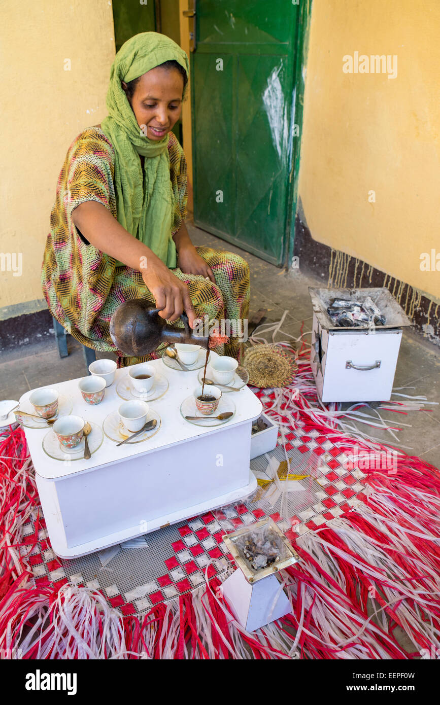 Ethiopian woman performing traditional coffee ceremony, Ethiopia Stock Photo