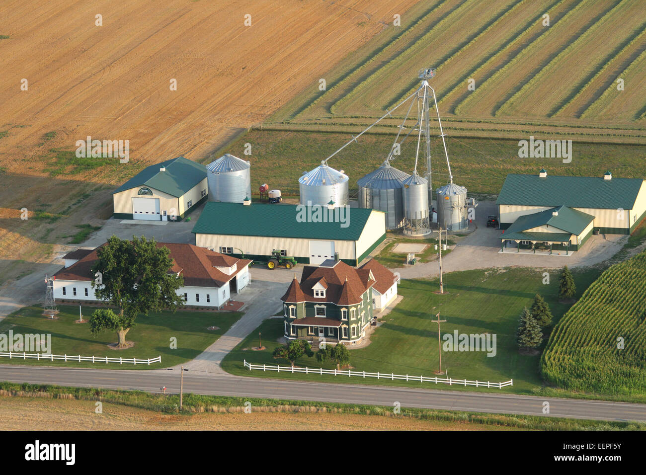 Aerial view of farm land and farm buildings. Purdy Field FlyIn. August