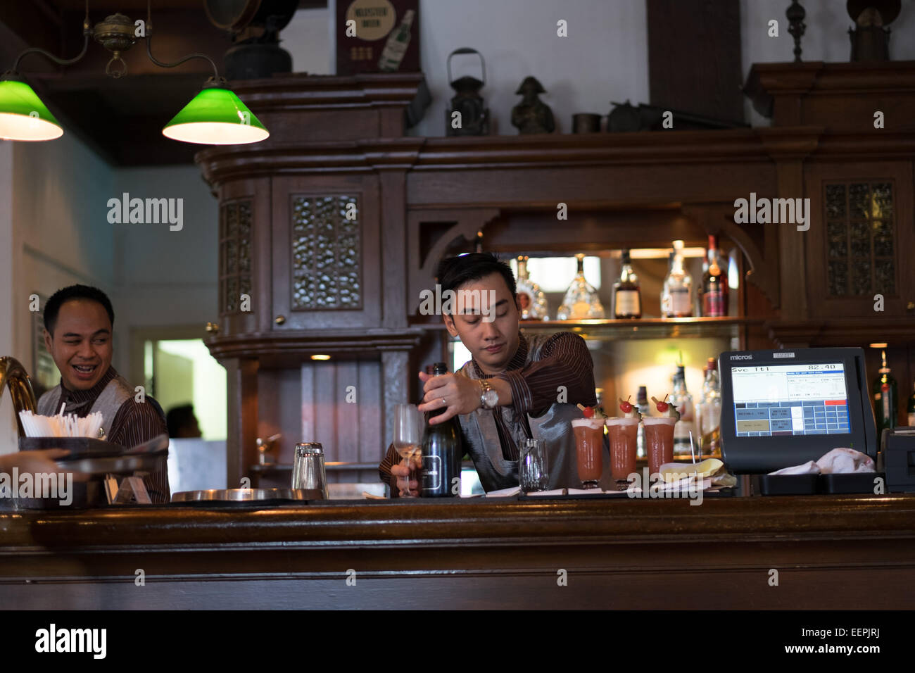 Inside the Long Bar of the Raffles Hotel in Singapore. Home of the Singapore Sling. Stock Photo