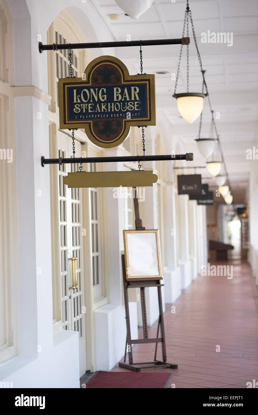 The Long Bar at the Raffles Hotel in Singapore. Home of the Singapore Sling. Stock Photo