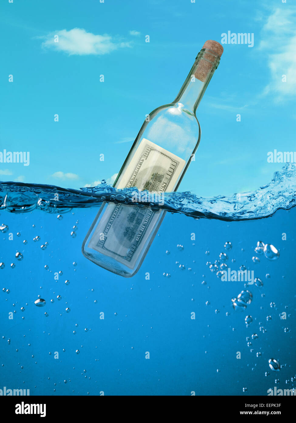 Concept "financial assistance". Bottle of money floating in the water