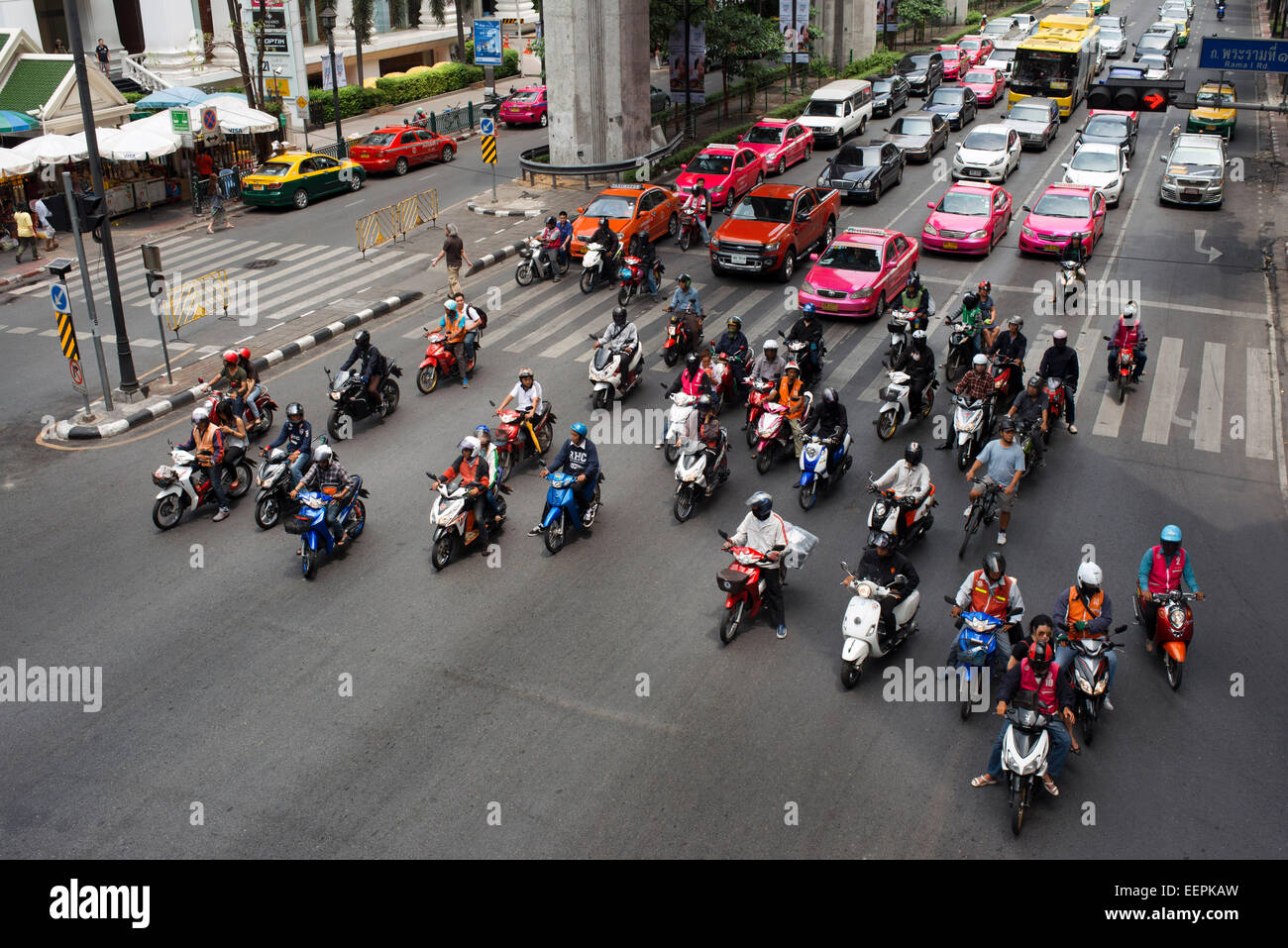 Traffic in Bangkok Near MBK Centre Thailand South East Asia. Motorbikes are ubiquitous in Thailand, but helmets are not. Activis Stock Photo