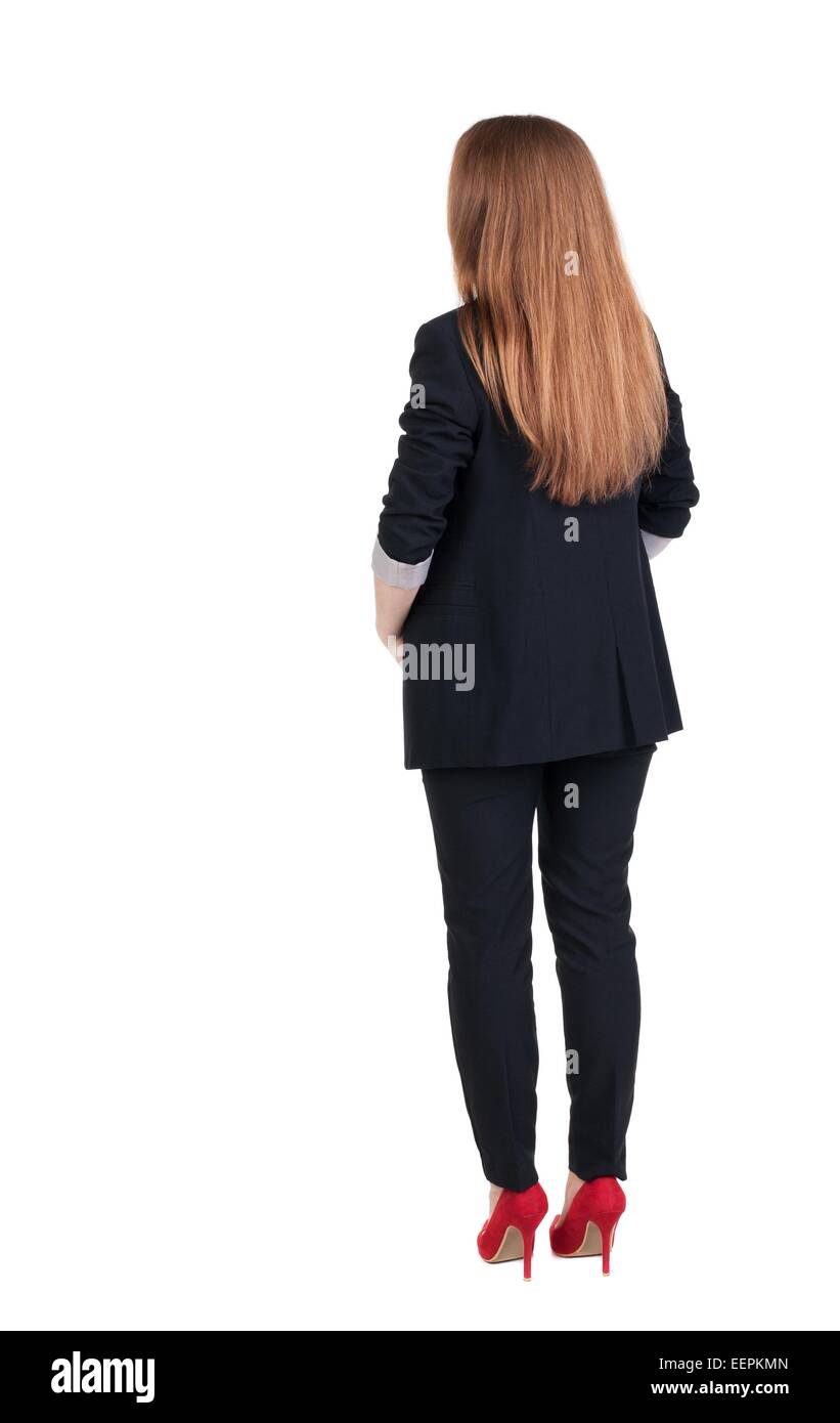 back view of redhead business woman contemplating. Young girl in suit ...