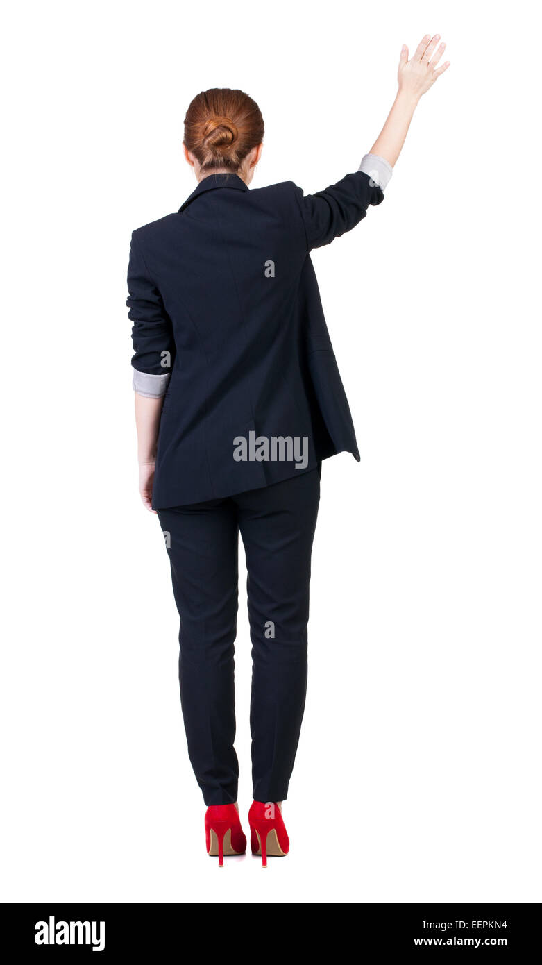 Back view of beautiful business woman welcomes. Young girl in suit ...