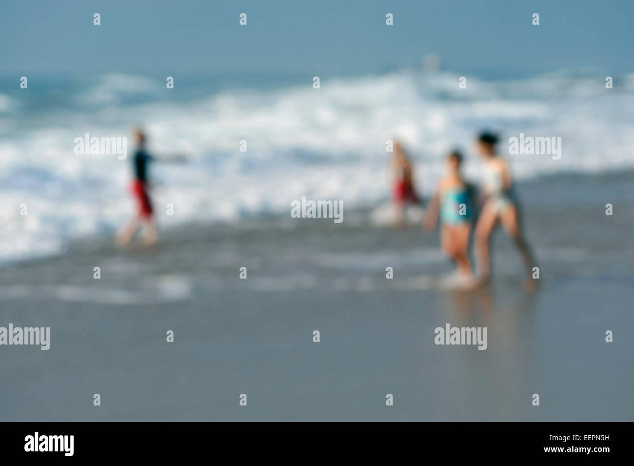 Abstract beach vacation, Umhlanga Rocks waterfront, Durban, South Africa, focus blur, people playing in surf, seaside holiday, leisure graphic, sea Stock Photo