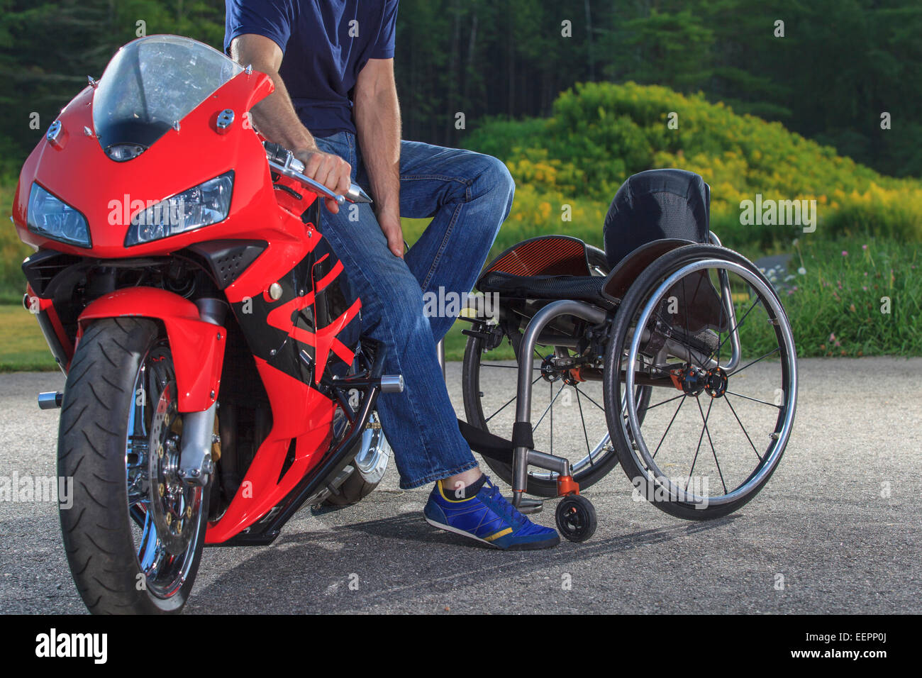 Man with spinal cord injury on his custom adaptive motorcycle Stock Photo