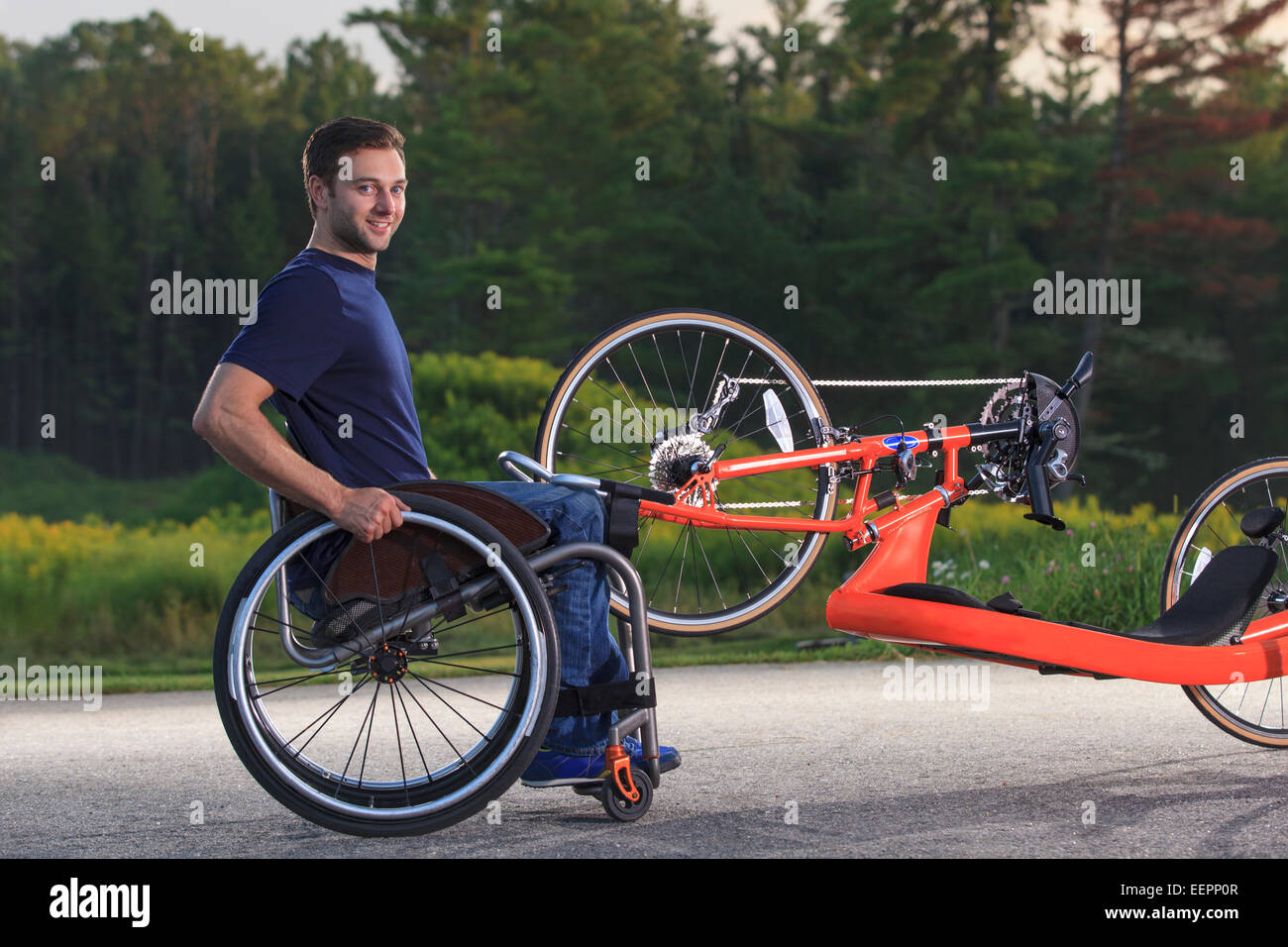 Man with spinal cord injury in his wheelchair with his custom adaptive