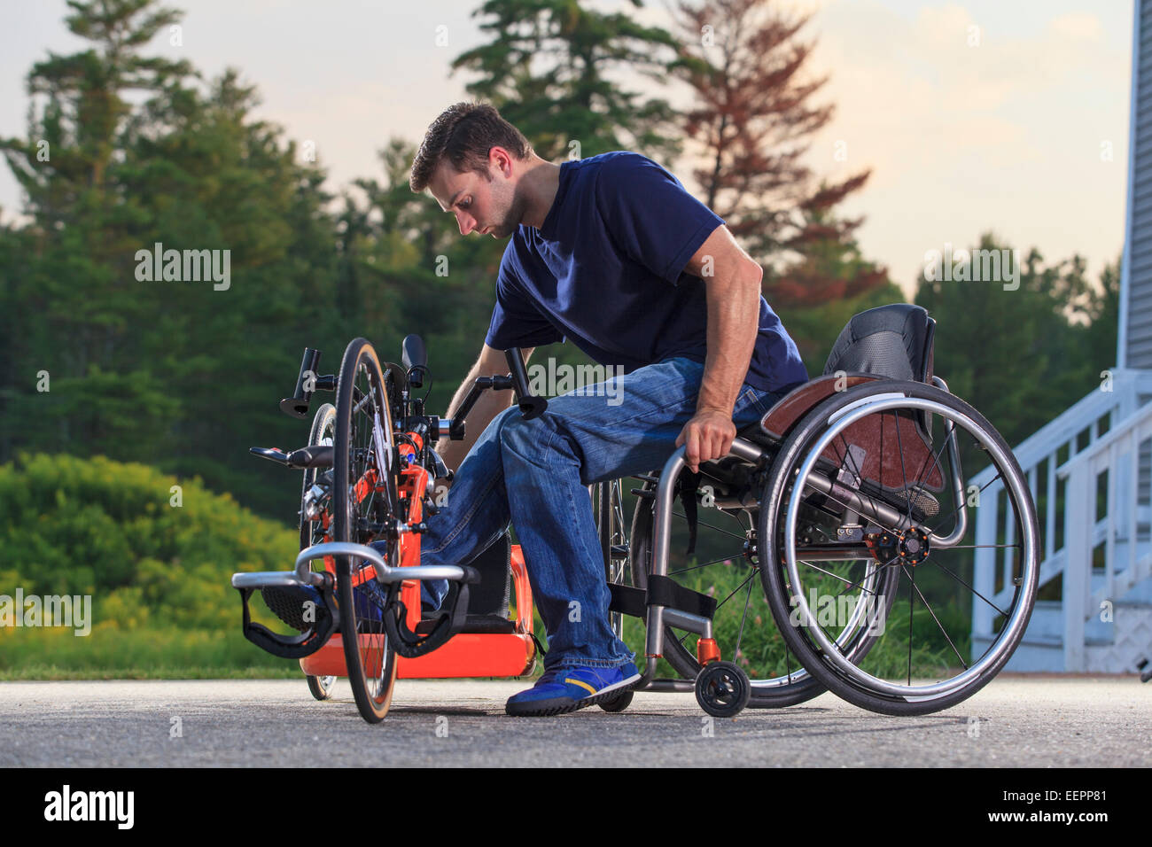 Man with spinal cord injury in his wheelchair getting on his custom