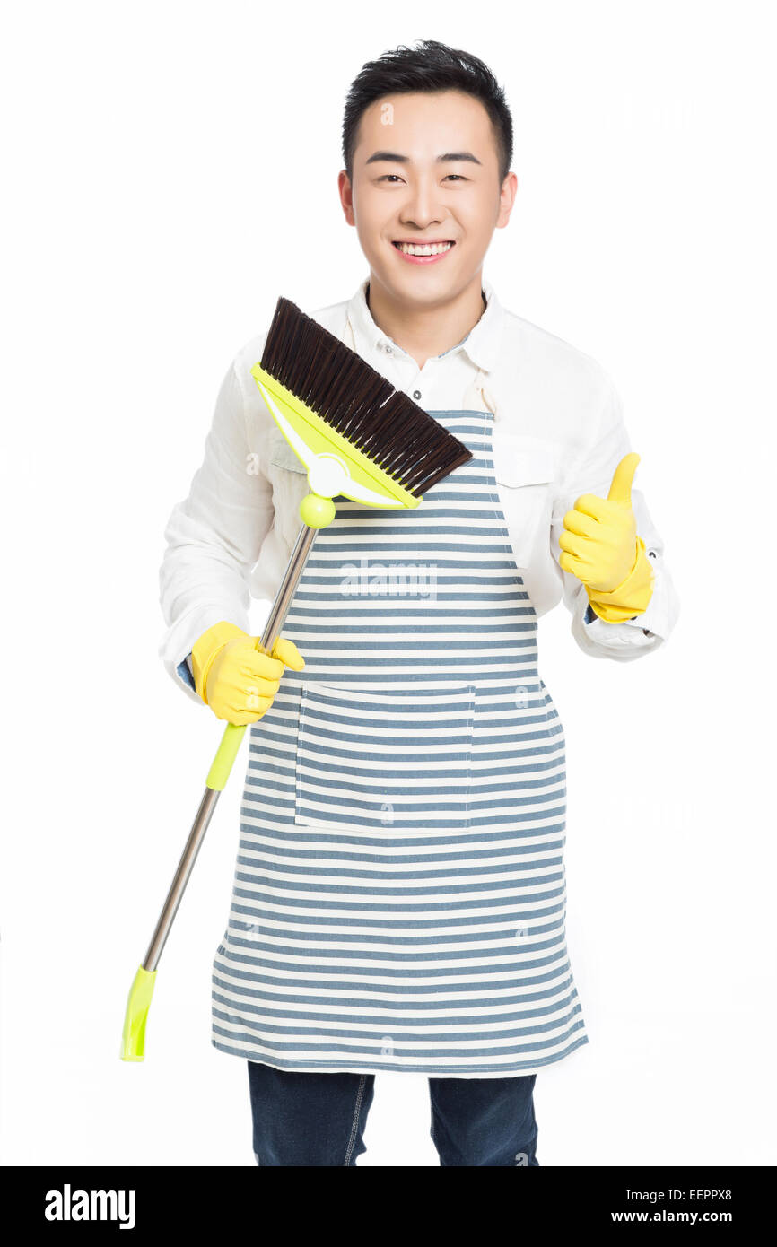 chinese male with cleaning sweep, white background Stock Photo Alamy