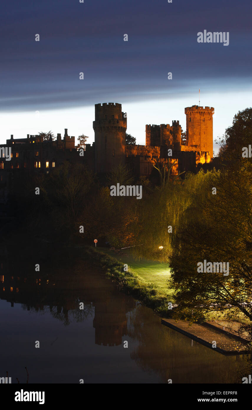 Warwick Castle, floodlit at dusk. Warwickshire. UK. Stock Photo