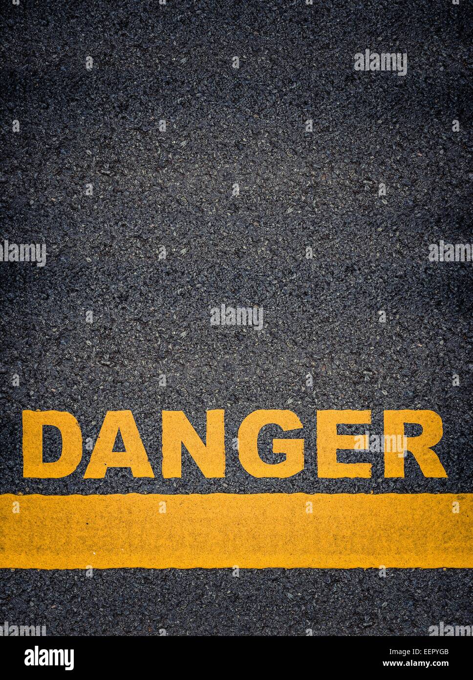 Danger As Yellow Asphalt Road Markings Stock Photo