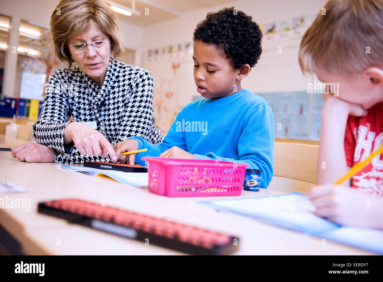 Children in school working with mathematics Stock Photo