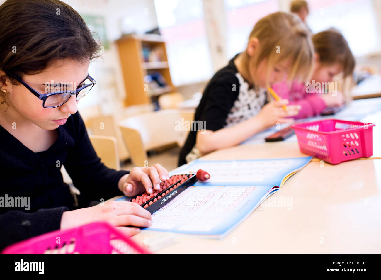 Children in school working with mathematics Stock Photo