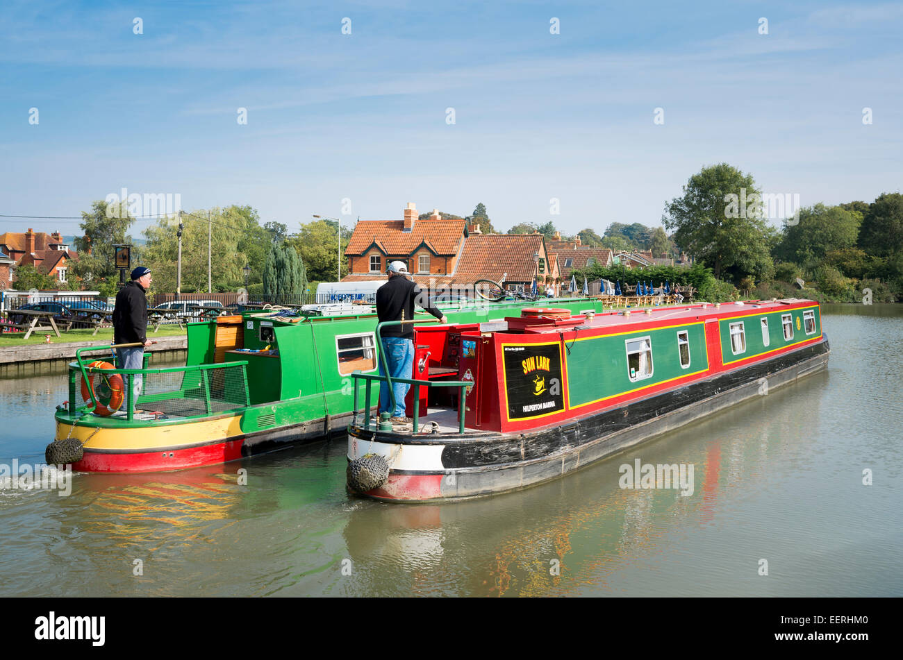Two narrow boats on the Kennet & Avon canal in Devizes UK Stock Photo